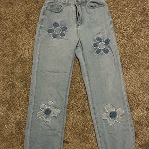 High waisted light blue flower jeans